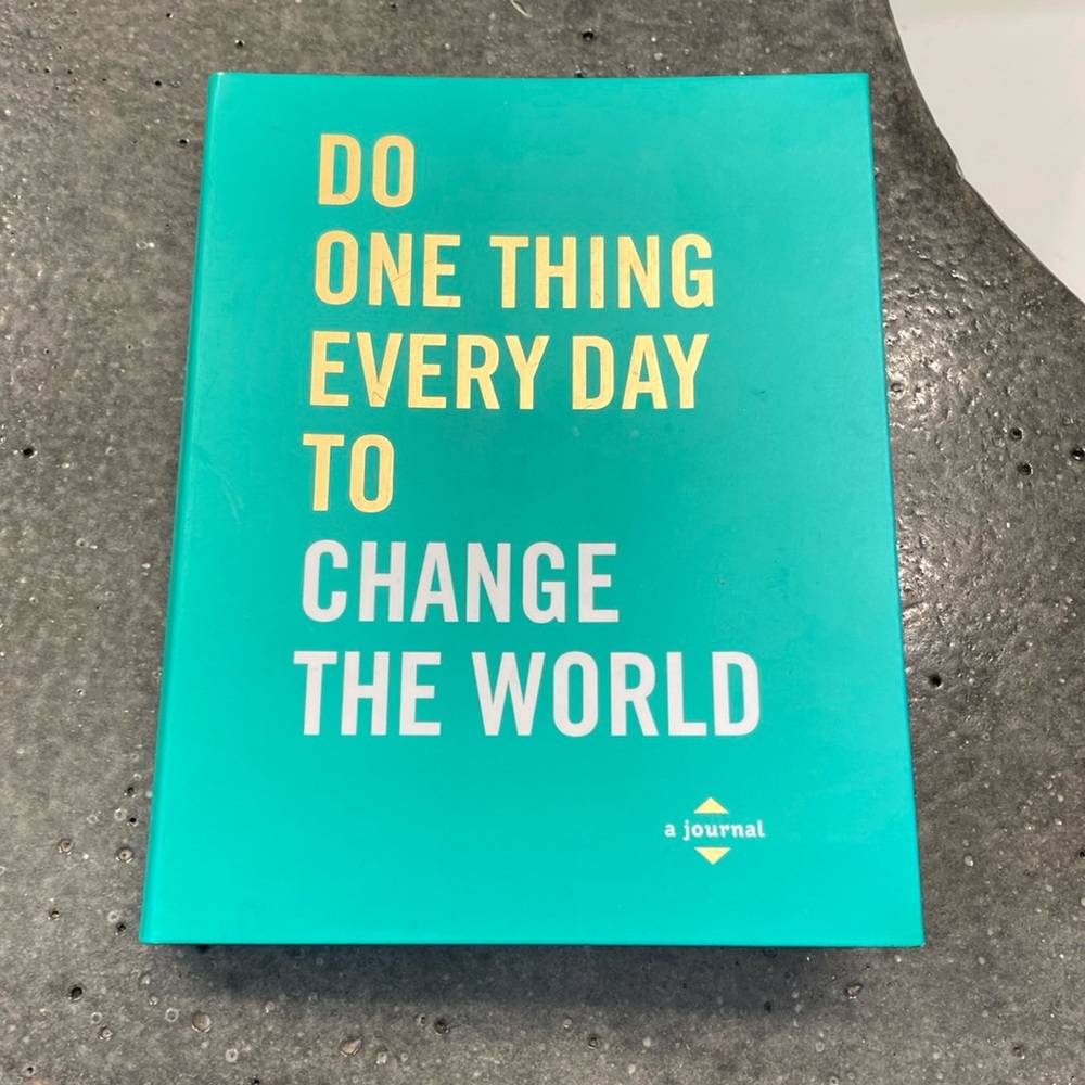Anthropologie book and journal “do one thing every day to change the world”